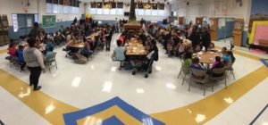 Adams Elementary families enjoying breakfast.